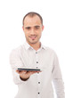 © Milles Studio - Man showing tablet computer and  smiling isolated on white backg