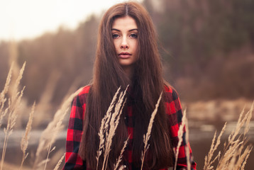 Beautiful girl posing in the grass