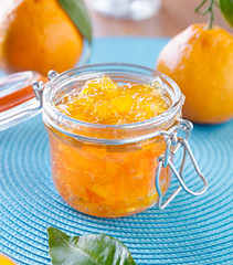 Wall Mural - jar of homemade orange preserves with open lid