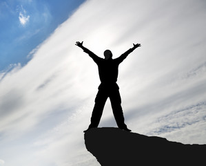 Canvas Print - Man on top of mountain.