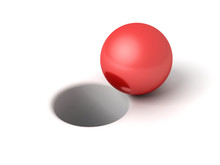 Red Shiny Ball In Front Of Hole On White Background