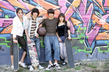 Teenagers Riding Skateboard