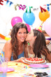 © auremar - mother and daughter at a birthdayparty