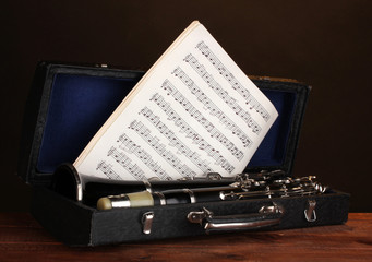 Wall Mural - old clarinet and notebook with notes in case