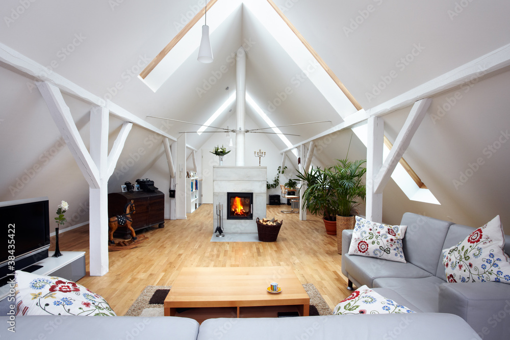 large, attractive attic room with wood-burning fireplace - obrazy, fototapety, plakaty 