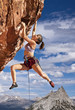 © Greg Epperson - Rock climber dangling.