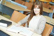 © Kadmy - young student girl study with book in library
