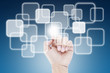 © kangshutters - hand pushing a button on a touch screen interface