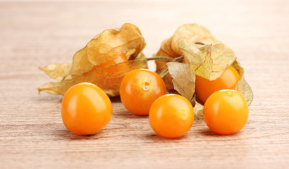 Canvas Print - physalis heap on wooden background