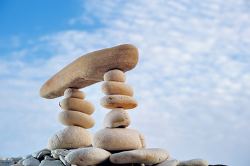 Wall Mural - Pebbles and cloudy sky