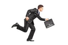 Businessman Running With A Briefcase
