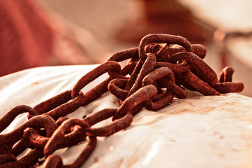 Rusty old chains of a boat