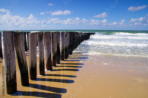 Tapeta ścienna Fale morskie toczące się po plaży