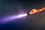 Fototapeta  - glowing pocket torch light
