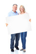 © grinny - Senior happy couple with placard.