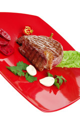 Poster - barbecued meat : beef ( lamb ) garnished on red plate