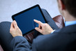 © Brian Jackson - Business man working on digital tablet