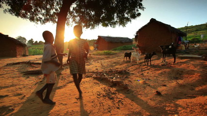 kids near a village in kenya africa.