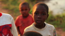 African Children Looking At The Camera In Keny, Africa.