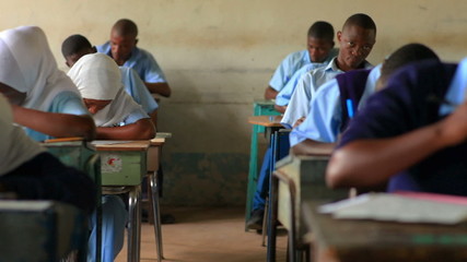 Wall Mural - Testing in a classroom in a school in Africa.