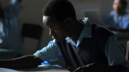 Wall Mural - Students taking an exam in a classroom in Kenya