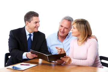 Senior couple with financial adviser.