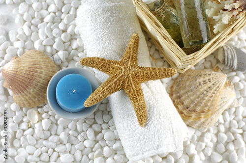 Fototapeta na wymiar Natural sea spa elements on white pebbles