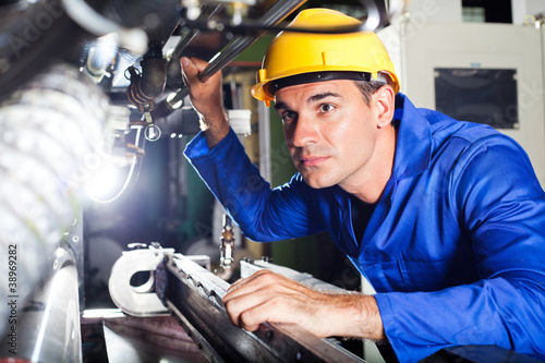 Fotografie, Obraz modern machine operator working in factory