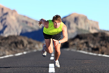 Wall Mural - Sprinter running on road