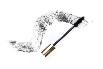 Black mascara brush stroke isolated on white