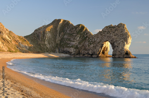 Late evening light at Durdle Door Lulworth Dorset England. Poster