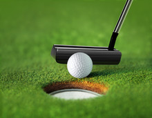 Closeup Golf Ball And Tee