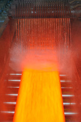 cooling hot steel on conveyor