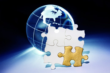 globe and white puzzle