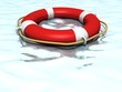 Life ring lifebuoy floating on top of sunny blue water