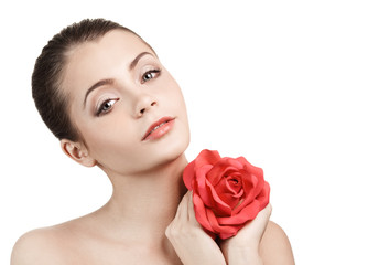 Wall Mural - Portrait of young beautiful woman with red rose