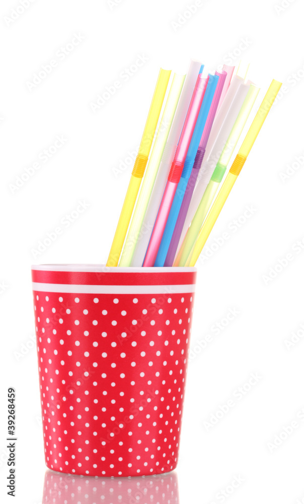 red glass with straws isolated on white