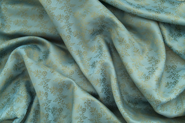 Light blue silk with floral ornament