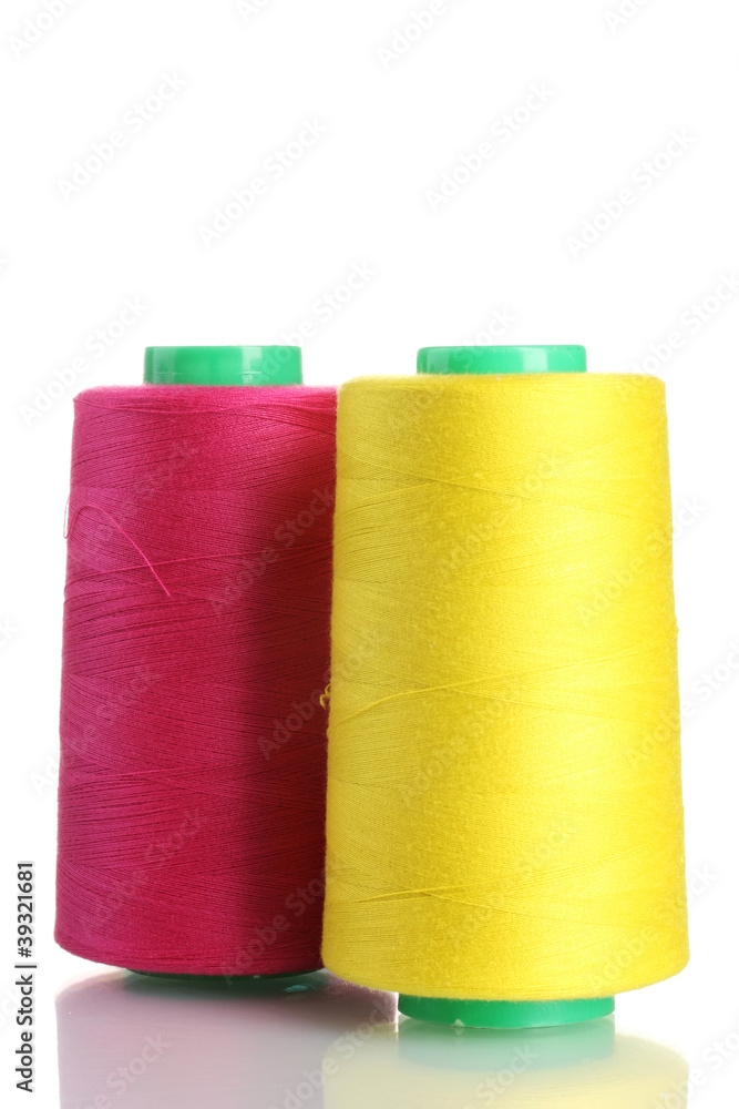 Bobbins of thread isolated on white