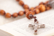 Rosary On Holy Bible