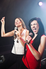 Female singers performing