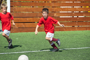 Wall Mural - little boys playing soccer