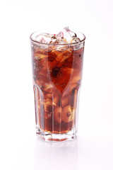 Cola in highball glass, isolated on white background