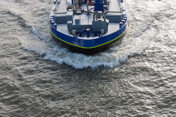 Wall Mural - Aerial view bow wave of a cargo ship