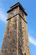 Historic clock tower against blue sky