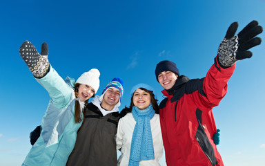 Wall Mural - group of happy young people in winter