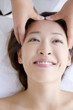 © Paylessimages - フェイスエステを受ける女性