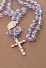 Rosary on Bible Cover