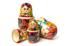 Russian Babushka Or Matryoshka Dolls On White Background