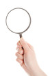 © Taigi - Hand holding magnifying glass